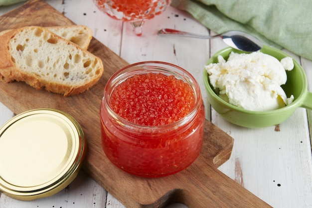 Red caviar on a wooden table bruschetta with caviar