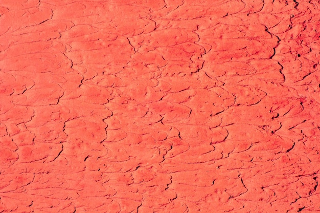 赤いセメントコンクリート抽象的なテクスチャの背景と壁紙