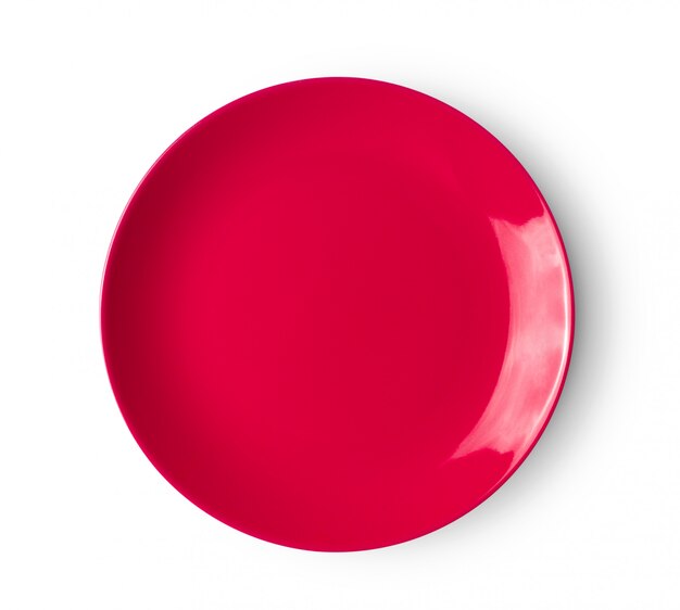 Red ceramic plate on white surface