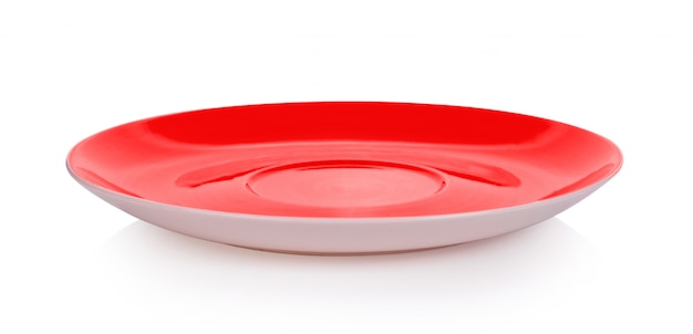 Red ceramic plate on white surface