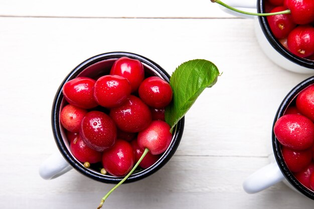 Red cherries in white basket