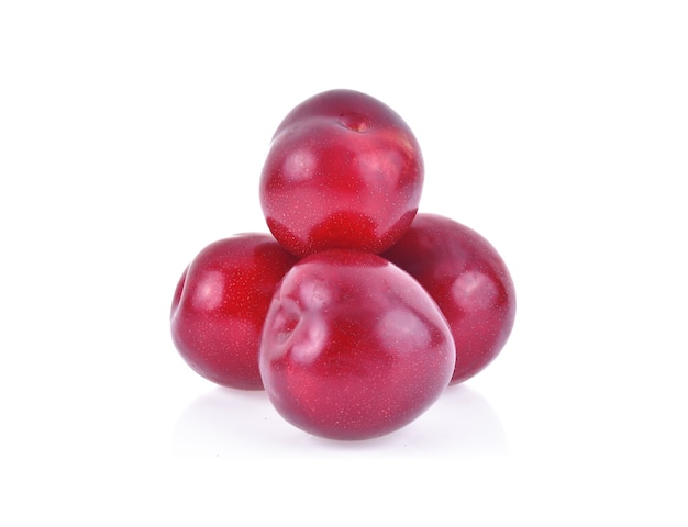 Red cherry plums isolated