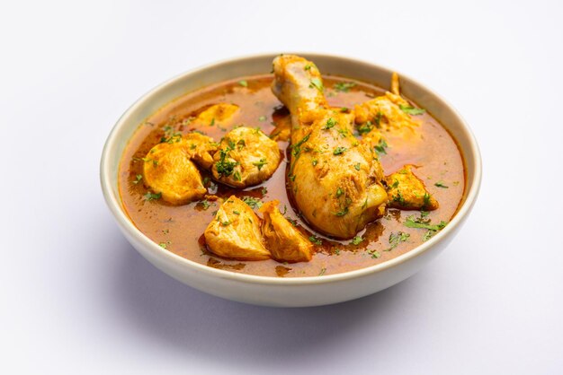 Red Chicken Curry or murgh Masala or korma with prominent Leg Piece