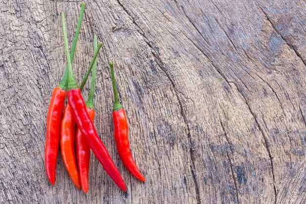 Red chili on an old wooden background