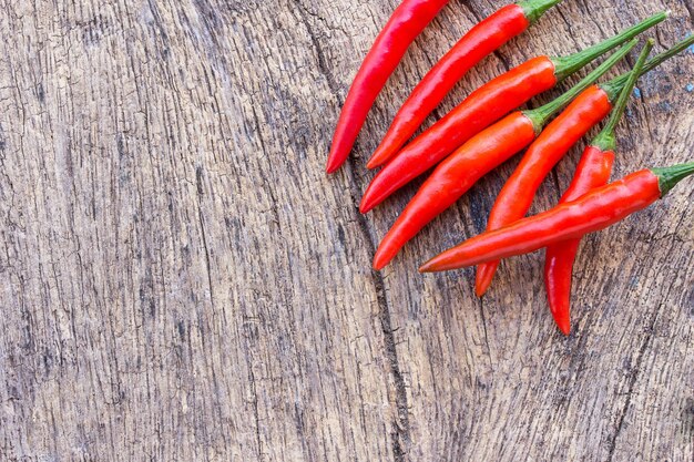 Red chili on an old wooden background