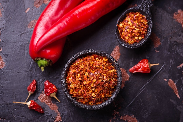 Red chili pepper on old rusty background