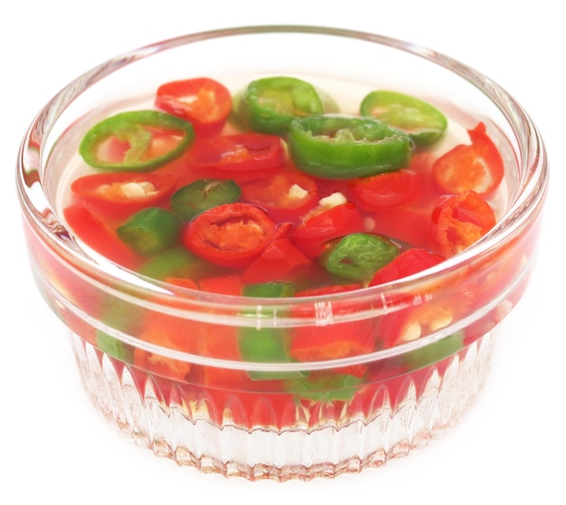 Red chili peppers in a glass bowl