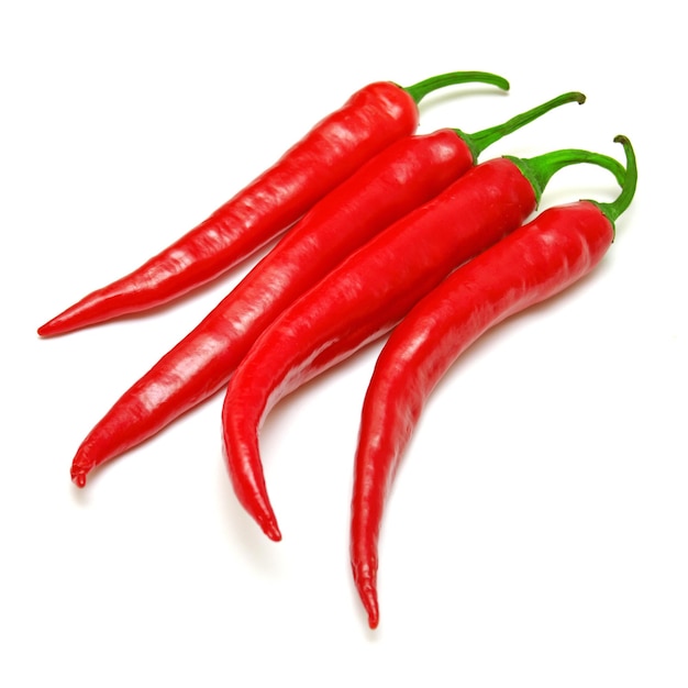 Red chili peppers isolated on a white background. Top view, flat