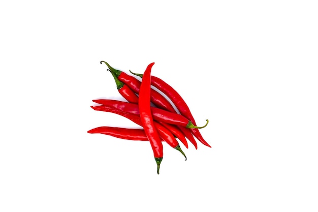 Red chili peppers isolated on white background with copy space Ripe chili peppers raw food ingredient concept Top view or flat lay