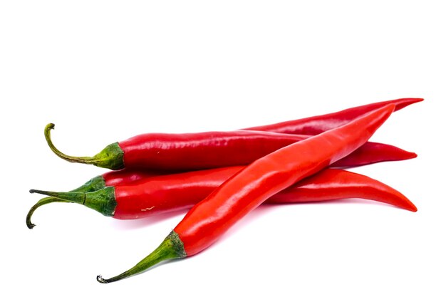 red chili peppers isolated on white background with copy space ripe chili peppers raw food ingredient concept