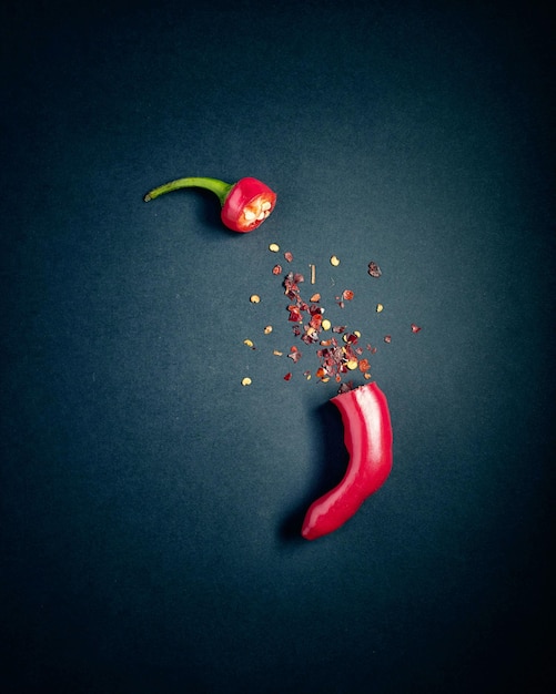 red chilli on black background