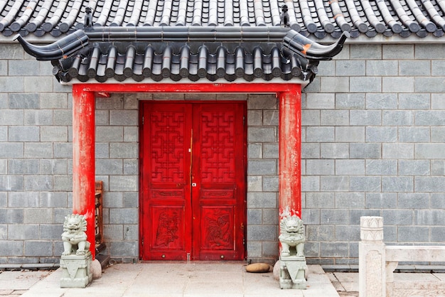 Red chinese door to temple