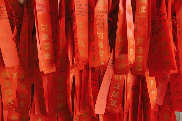 Red Chinese ribbons in the temple in China town Bangkok