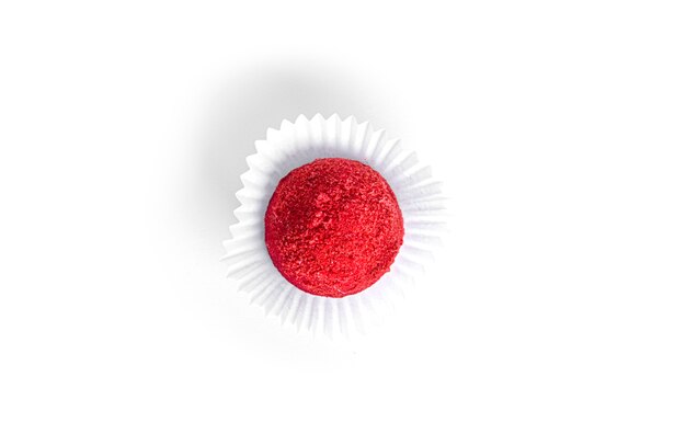 Red, chocolate candy truffle isolated. Raspberry candy.