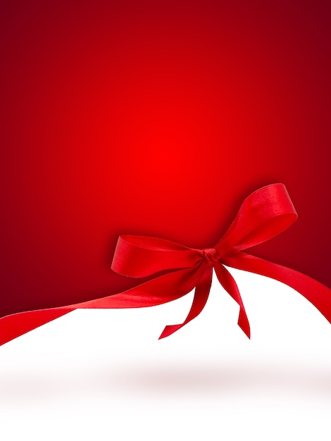 Red Christmas background with a bow