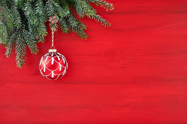 Red Christmas background with decoration. Copy space