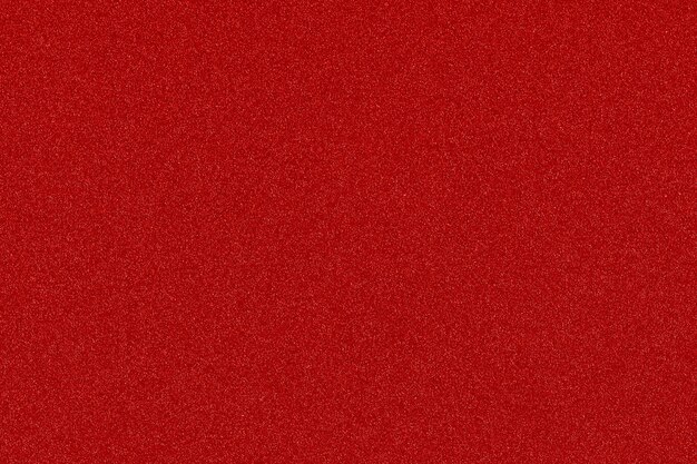 Photo red christmas background with shiny color speckles