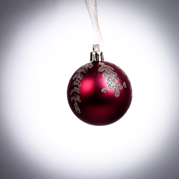 Red christmas ball isolated on a white background