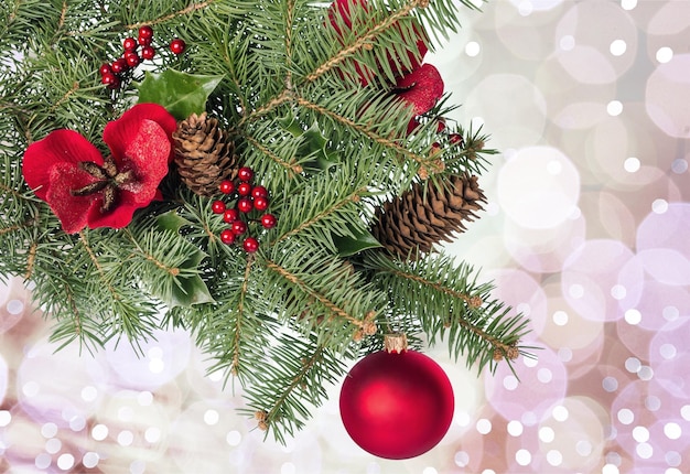 Red christmas ball with fir on background