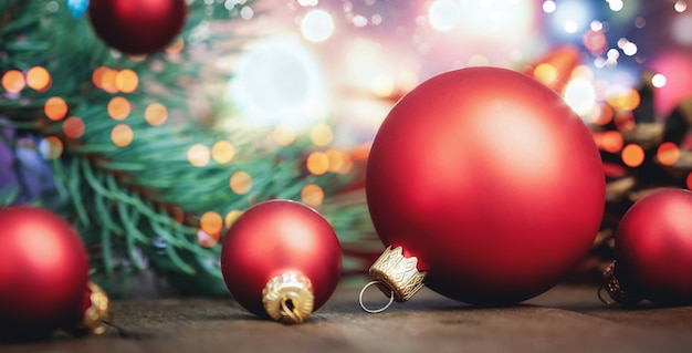 Red Christmas balls on defocused lights