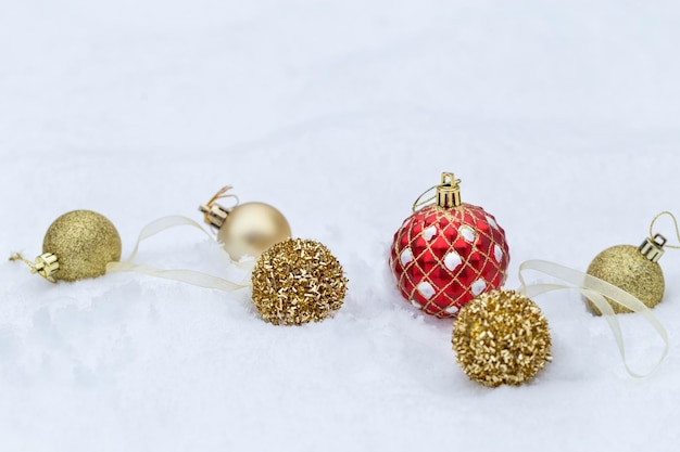 Red Christmas balls on snow background, Christmas banner