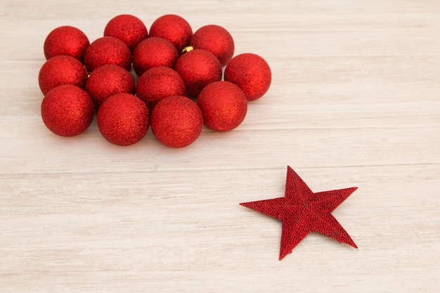 Red Christmas balls and star with glitter