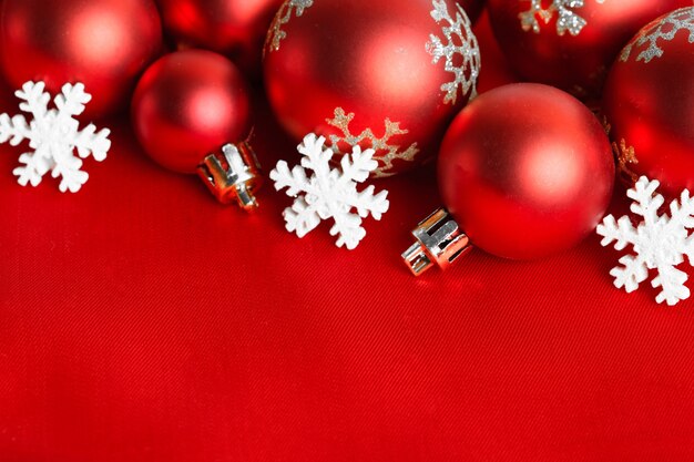 Red Christmas balls, wrapped in red cloth