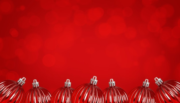 Red Christmas decorations on a red background with defocused lights