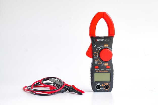 Red clamp multimeter measuring clipping path