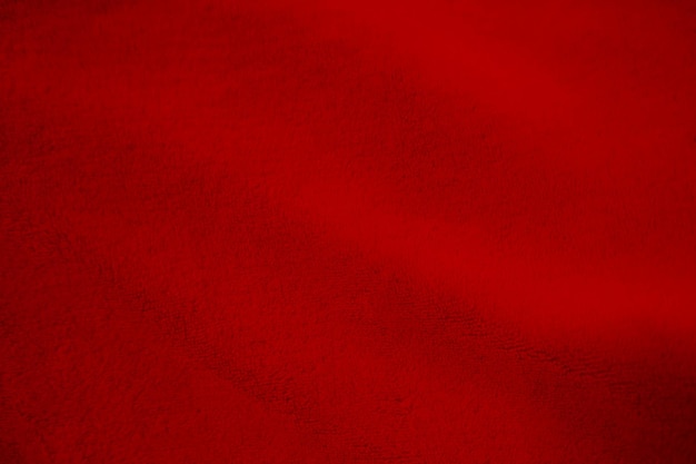 Red clean wool texture background light natural sheep wool red seamless cotton texture of fluffy fur for designers closeup fragment red wool carpet