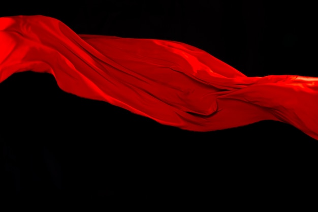 Foto red cloth fly air, plaid in tessuto di raso rossastro