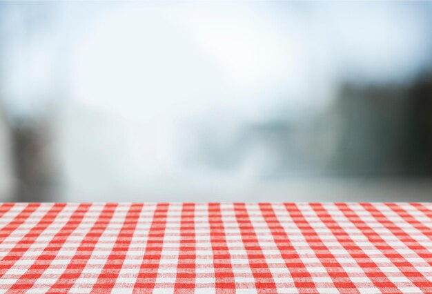 Photo red cloth napkin on wooden background