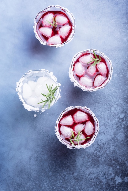 Red cocktail with ice