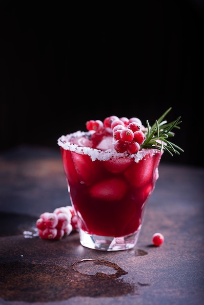 Red cocktail with ice