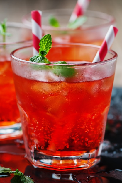 Red Cocktail with mint and ice