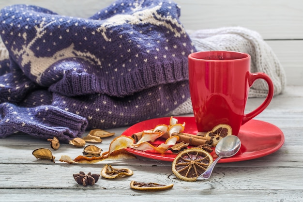 red coffee Cup on a plate, wooden table, beverage, Christmas morning