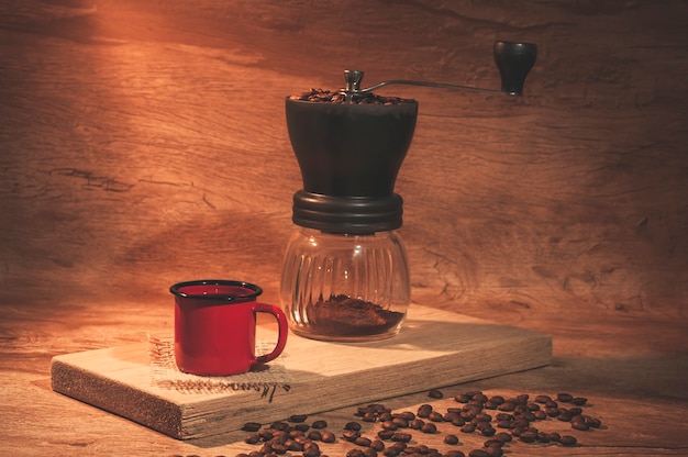 Red coffee mug with coffee grinder