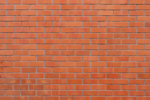 Red color brick wall for brickwork background and texture.