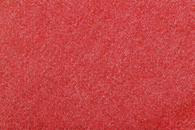 red color jeans texture factory fabric on white background close up