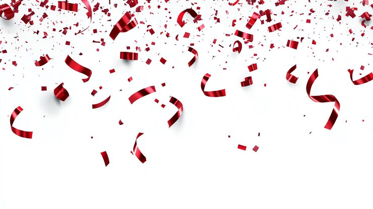 Photo red colored confetti falling
