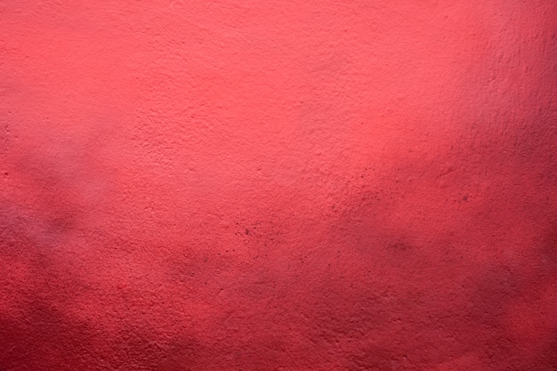 Red concrete wall texture at building - background