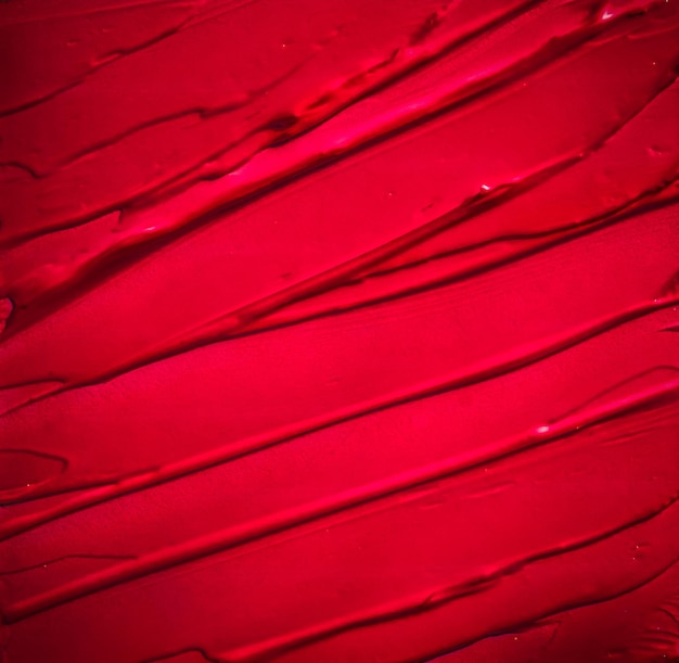 赤い化粧品テクスチャ背景メイクとスキンケア化粧品製品クリーム口紅保湿剤マクロ高級美容ブランド ホリデー フラットレイ デザインとして