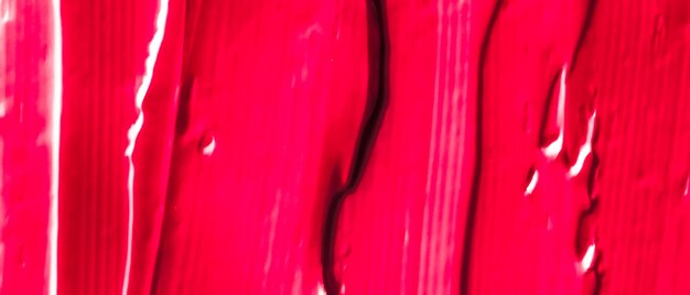 Красная косметическая текстура фон макияж и косметика по уходу за кожей продукт крем помада увлажняющий макрос как роскошный косметический бренд праздничный плоский дизайн