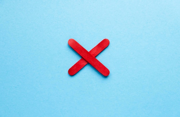 red cross on a blue background. prohibition sign