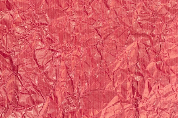 Red crumpled paper texture background Full frame