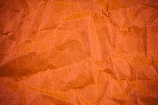 Red crumpled paper texture.