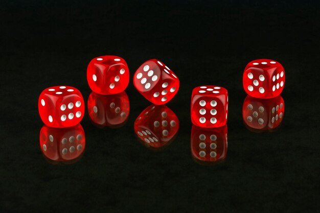 Red cubes for poker are reflected in the glass surface