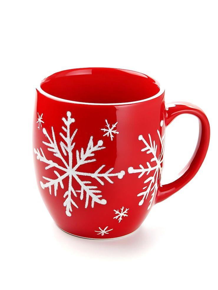 Photo a red cup with snowflakes on it