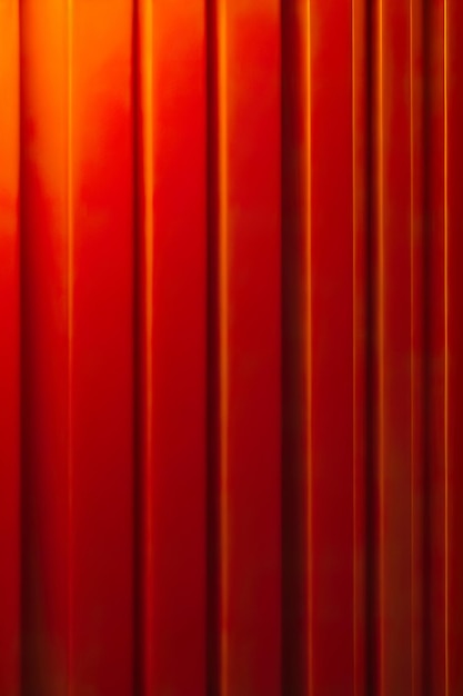 A red curtain with a red tint in the corner