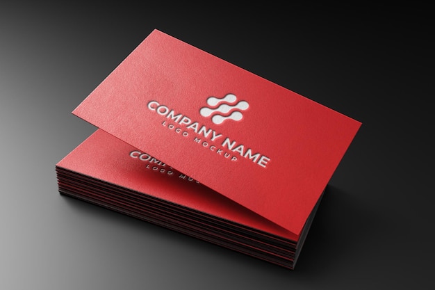 Photo red debossed business card on dark background